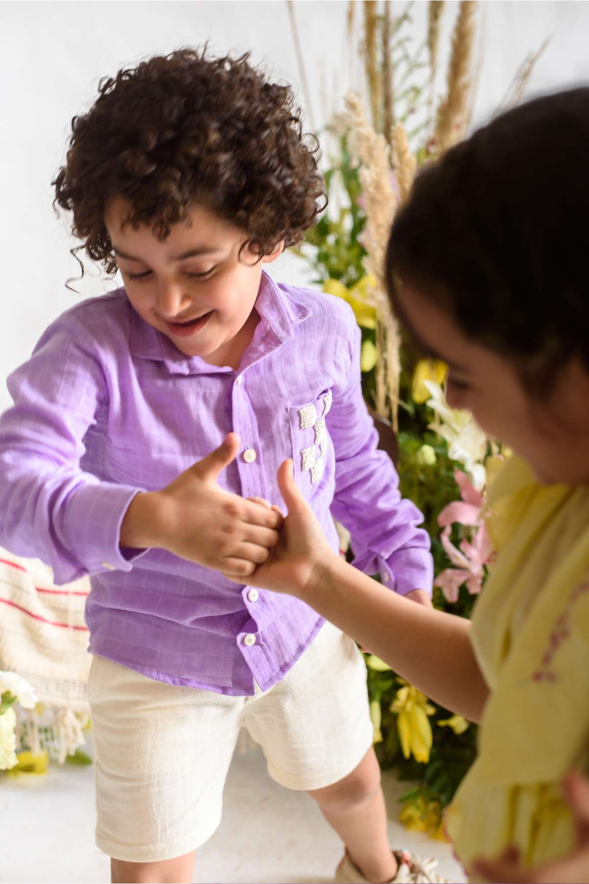 Buy Kids Designer Littleens Shirt with floral knots on the pocket, natural button and standing collar Online at ScrollnShops